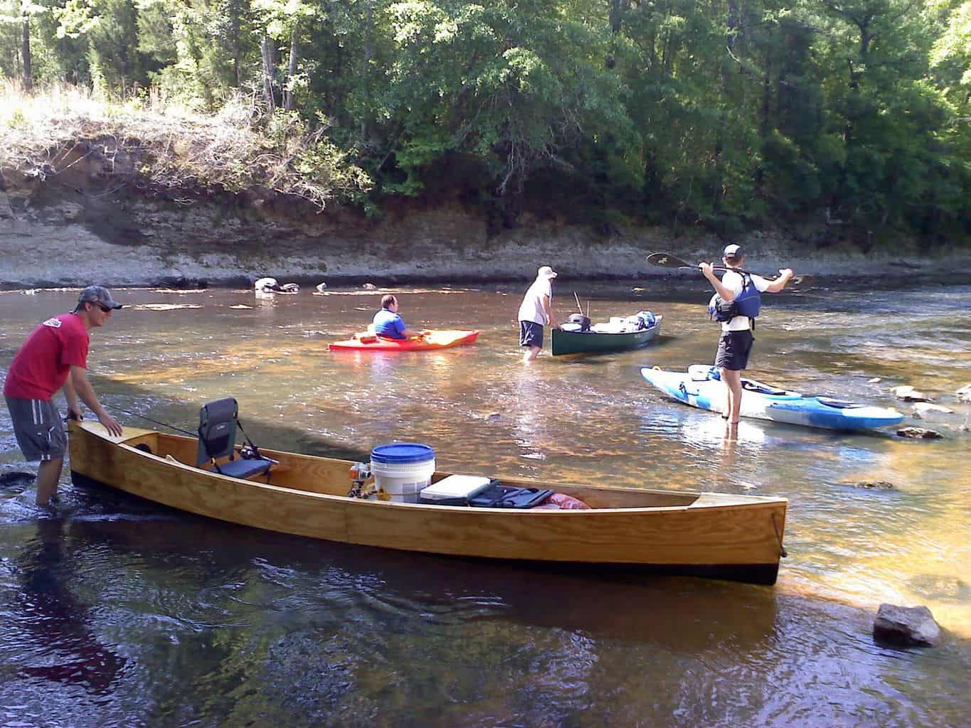 phil and his quick canoe, touring in a simple plywood canoe.