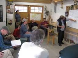 Michael Storer giving a talk at Clint Chase Boatbuilder.