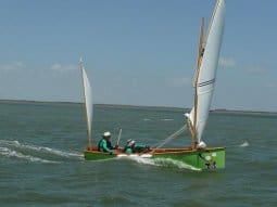 Goat Island Skiff going fast downwind with heavy load - Texas 200