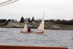 Beth sailing canoe heading downwind with little fuss in British Columbia - article on fleet racing BETH.