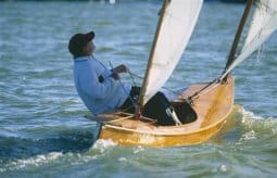 Beth sailing canoe winding upwind. Nice trim and concentration. storerboatplans.com